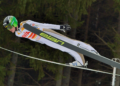 how is it possible for ski jumpers to stay in the air so long and how do they train for that?