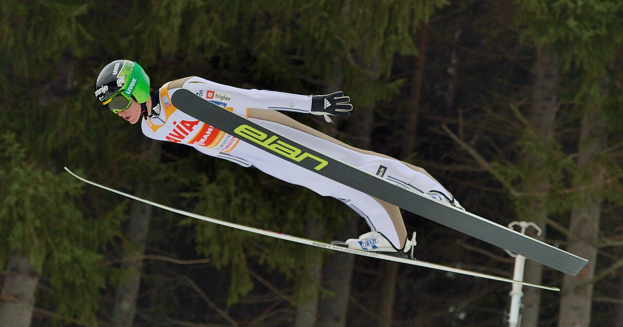 how is it possible for ski jumpers to stay in the air so long and how do they train for that?
