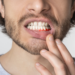 why is my gum swollen around one tooth in the back