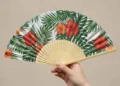Bamboo vs plastic: Which personalised fans fit your brand?