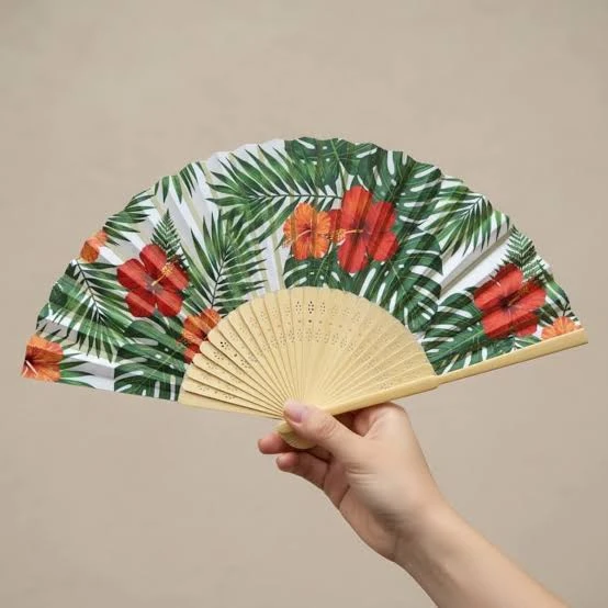Bamboo vs plastic: Which personalised fans fit your brand?